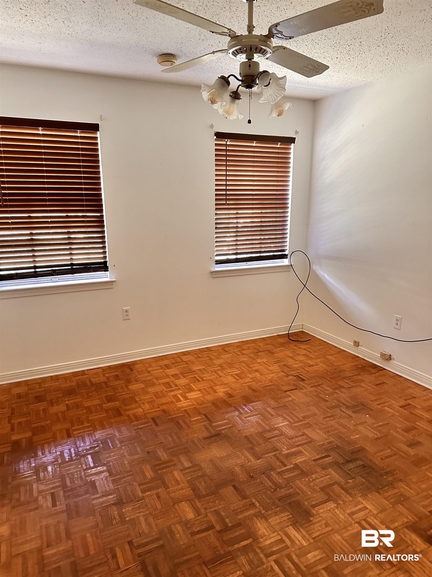 22 Caisson Trace Spanish Fort, AL 36527 - Photo 7 of 11 Primary Bedroom w/ Pergo