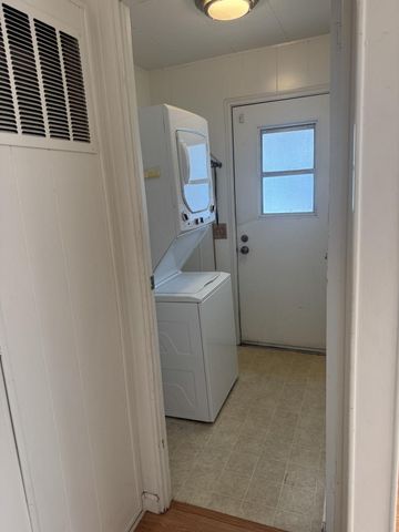 a utility room with a washer and dryer