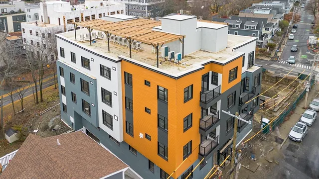 an aerial view of a multi story buildings