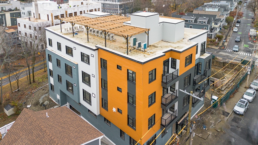 an aerial view of a multi story buildings