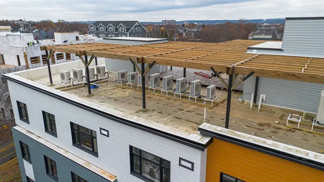 a view of a swimming pool with a lounge chair