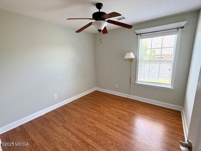 304 Stonebrook Circle Byron, GA 31008 - Photo 17 of 29 a view of an empty room with wooden floor and a window