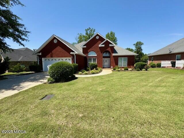 304 Stonebrook Circle Byron, GA 31008 - Photo 2 of 29 a front view of a house with a yard