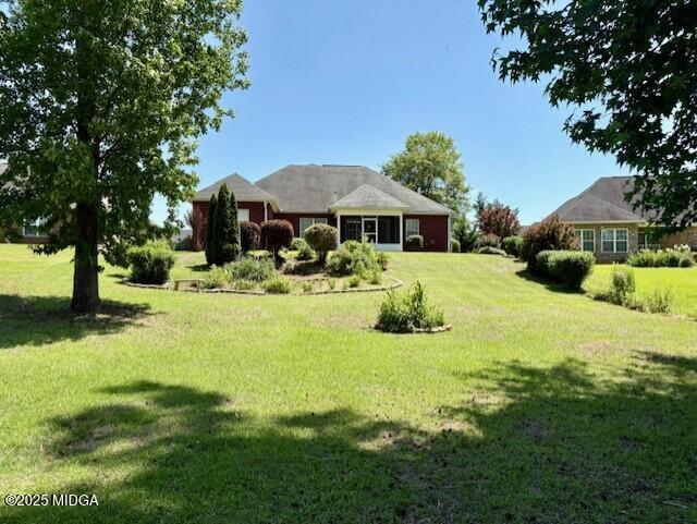304 Stonebrook Circle Byron, GA 31008 - Photo 26 of 29 a front view of a house with yard and trees