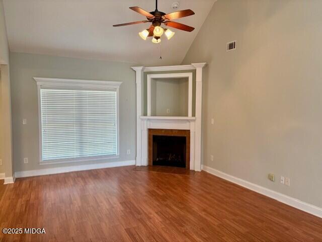 304 Stonebrook Circle Byron, GA 31008 - Photo 29 of 29 a view of a livingroom with a fireplace a ceiling fan and windows