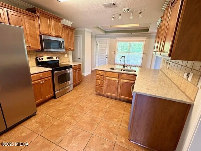 304 Stonebrook Circle Byron, GA 31008 - Photo 5 of 29 a kitchen with stainless steel appliances granite countertop a sink stove microwave and refrigerator
