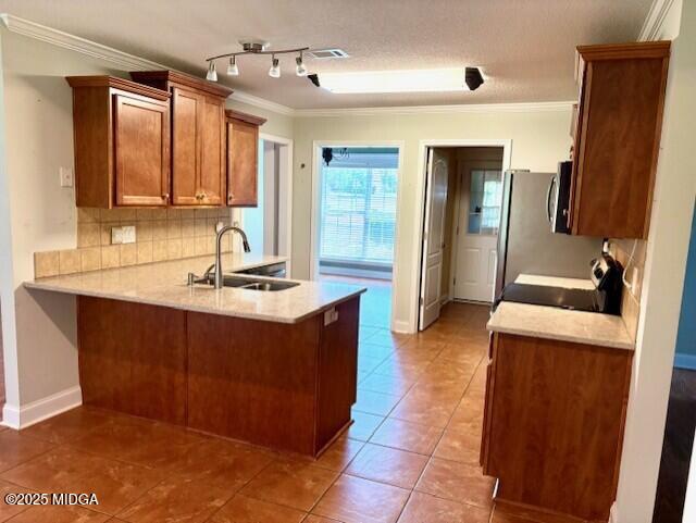 304 Stonebrook Circle Byron, GA 31008 - Photo 6 of 29 a kitchen with kitchen island granite countertop wooden cabinets and sink