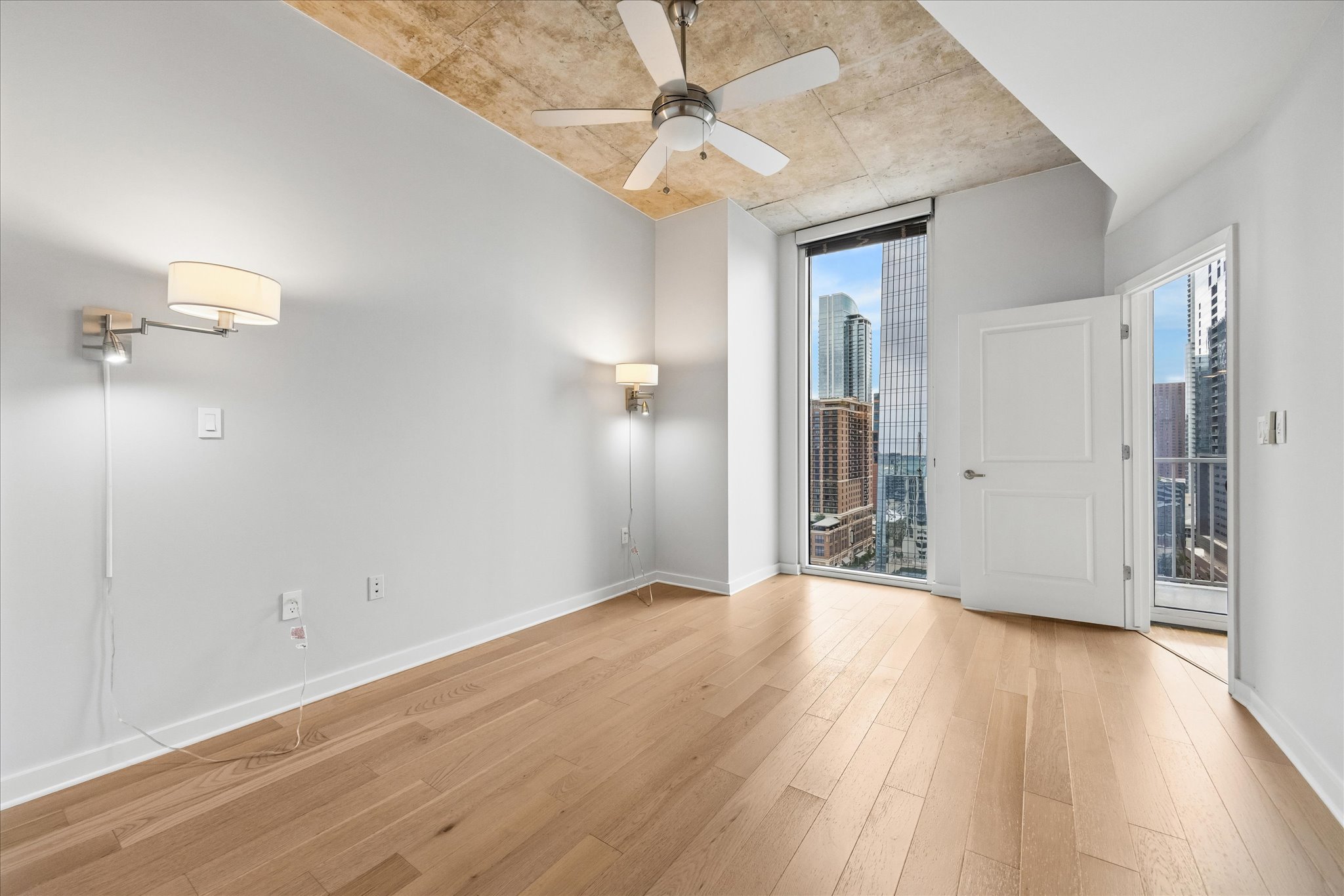 360 Nueces Street, Unit 2005 Austin, TX 78701 - Photo 7 of 35 Primary bedroom with city and lake views !