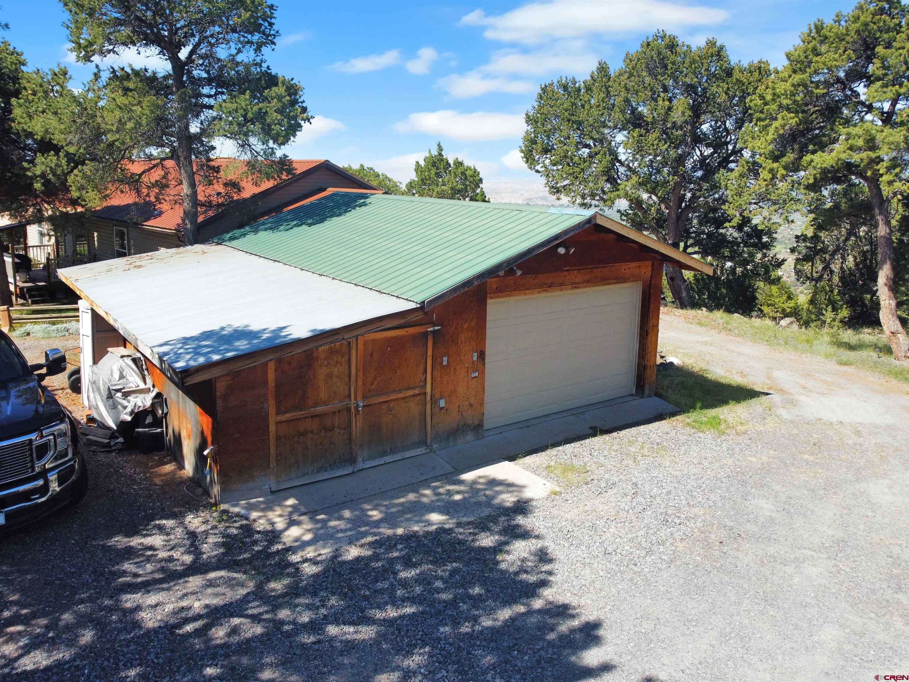 18311 2550th Road Cedaredge, CO 81413 - Photo 21 of 29 a backyard of a house with lots of green space