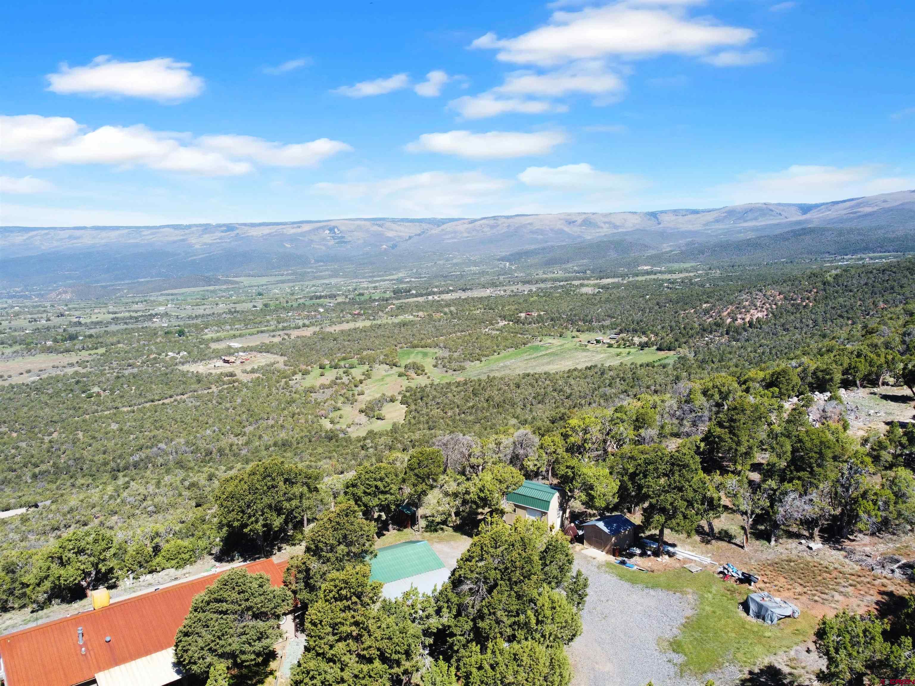 18311 2550th Road Cedaredge, CO 81413 - Photo 24 of 29 a view of a city with an ocean
