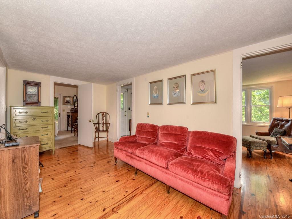 4607 Old Clyde Road Clyde, NC 28721 - Photo 2 of 24 a living room with furniture and wooden floor