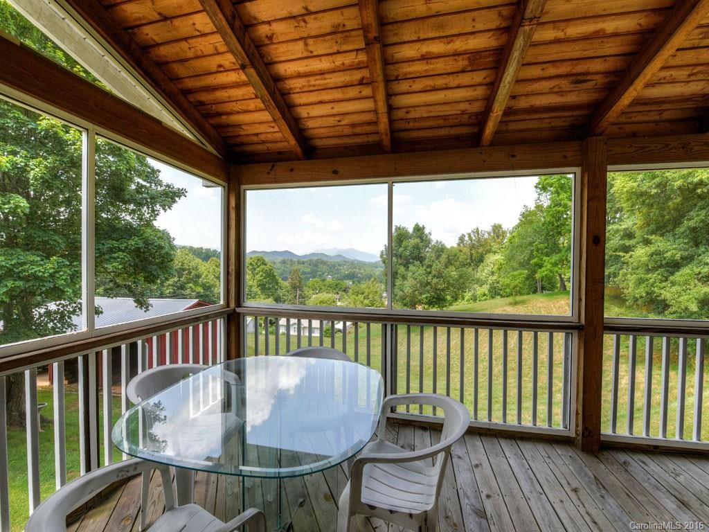 4607 Old Clyde Road Clyde, NC 28721 - Photo 16 of 24 a view of a chair and table in the balcony