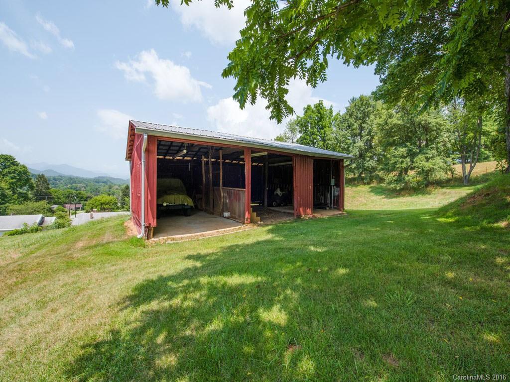 4607 Old Clyde Road Clyde, NC 28721 - Photo 21 of 24 a view of a house with backyard