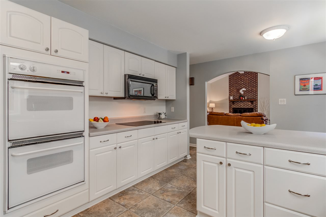 2541 Countrywood Road Raleigh, NC 27615 - Photo 13 of 25 Kitchen open to family room