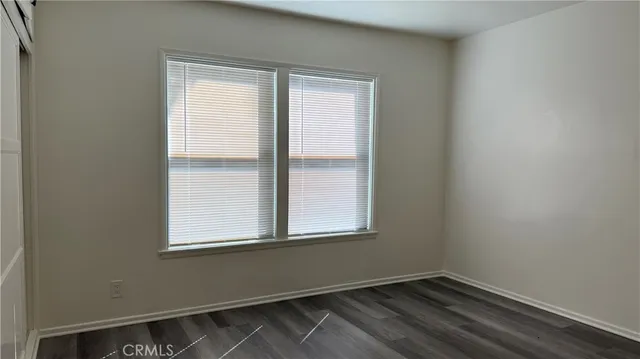 a view of a room that has a window in it