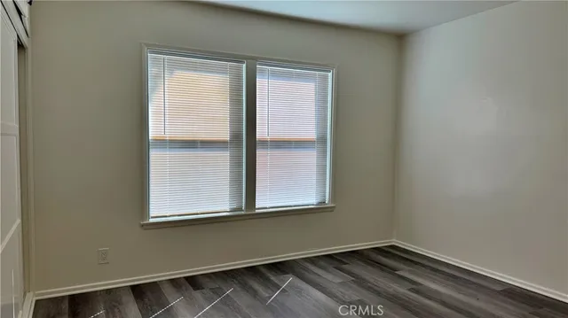 a view of a room that has a window in it