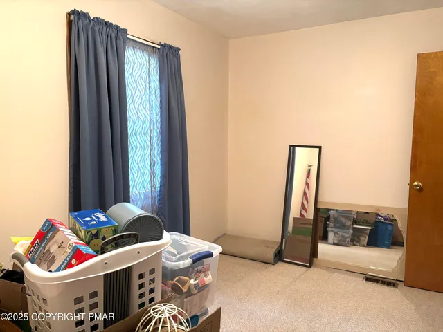 a living room with a couch and a table