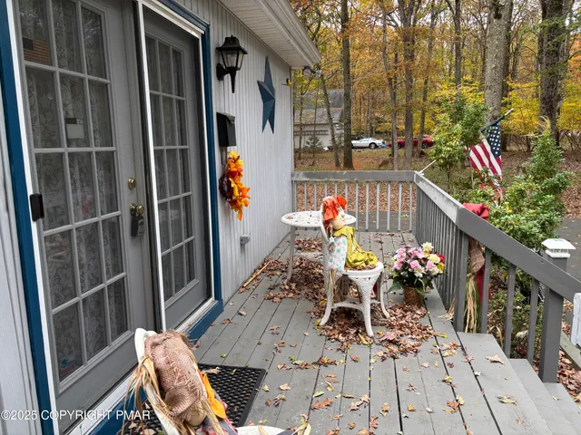 a view of balcony and chairs
