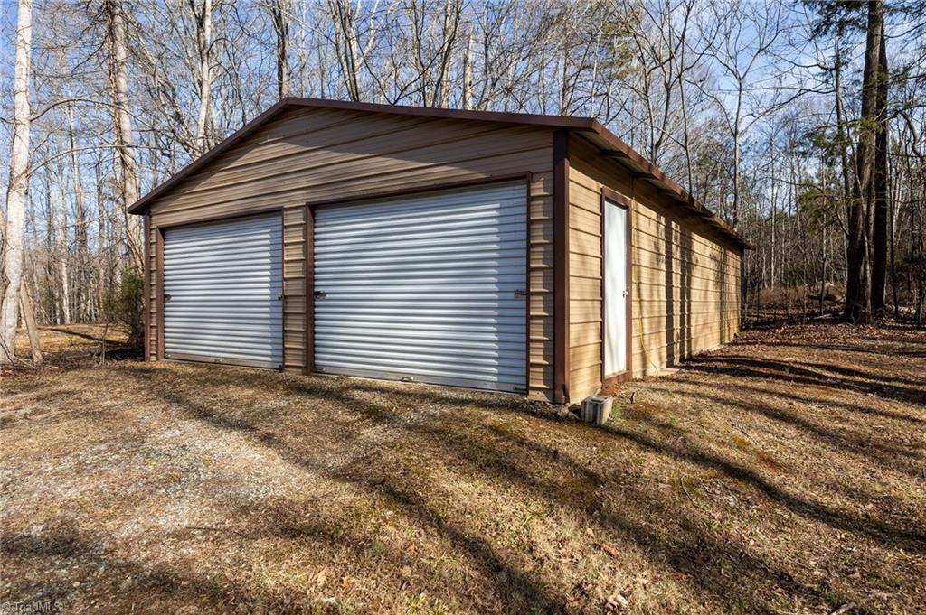 1360 Koonce Drive Trinity, NC 27370 - Photo 11 of 37 Huge 23x43 and detached 2 car garage/shed.