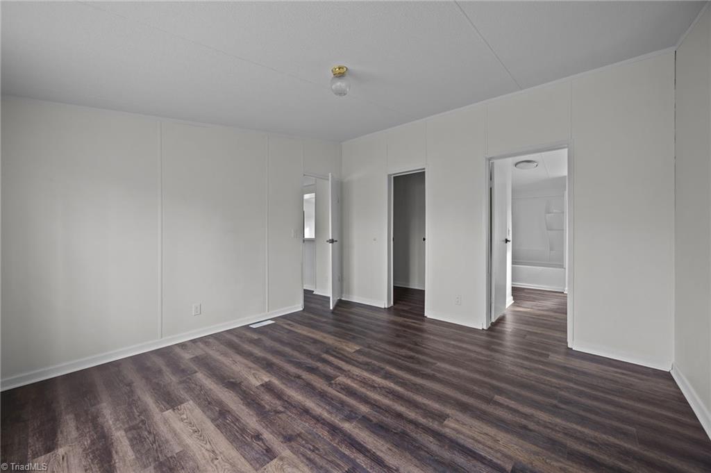 1360 Koonce Drive Trinity, NC 27370 - Photo 20 of 37 Primary bedroom with ensuite bath and walk in closet.
