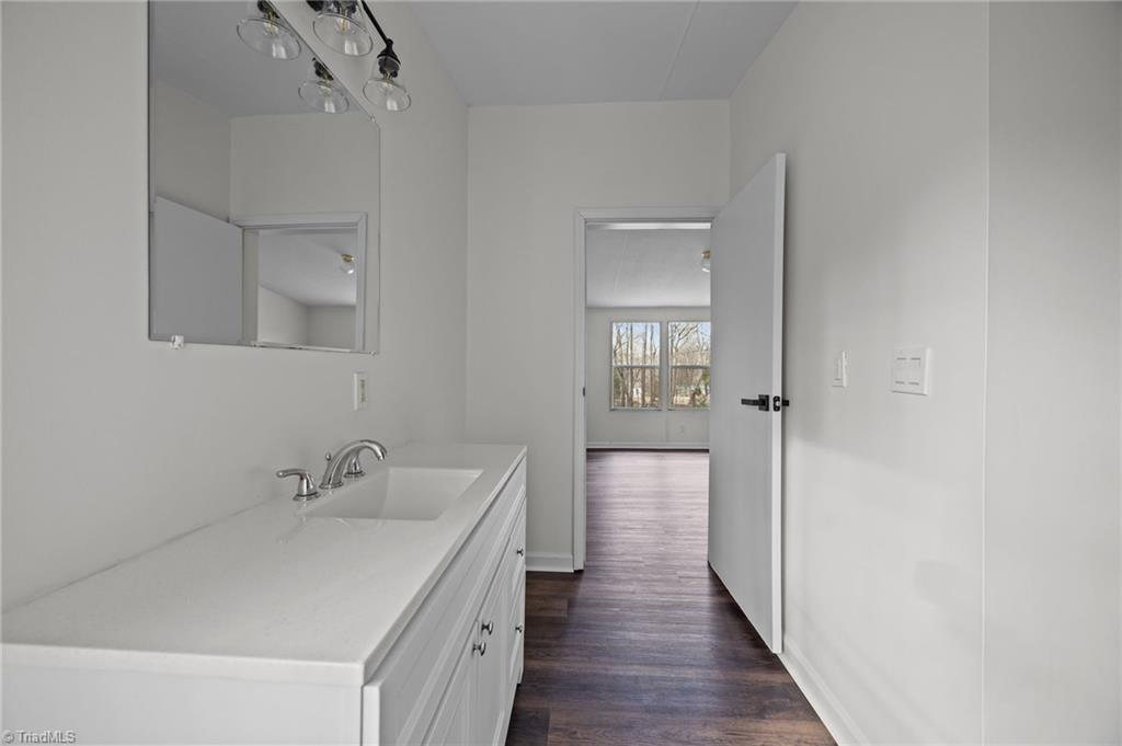 1360 Koonce Drive Trinity, NC 27370 - Photo 21 of 37 Primary bathroom with single vanity and shower & tub combo.