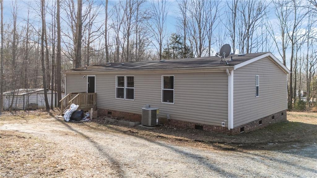 1360 Koonce Drive Trinity, NC 27370 - Photo 25 of 37 Another angle showing the back exterior of the home.