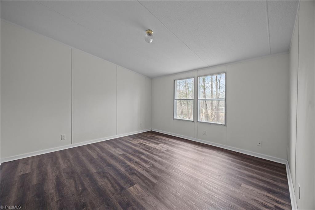 1360 Koonce Drive Trinity, NC 27370 - Photo 7 of 37 Spacious primary bedroom.