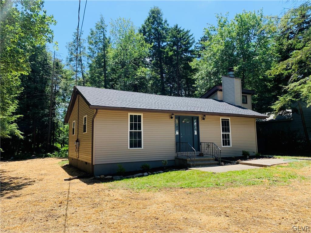 3122 Sycamore Pocono Summit, PA 18346 - Photo 2 of 3 a view of a house with a yard