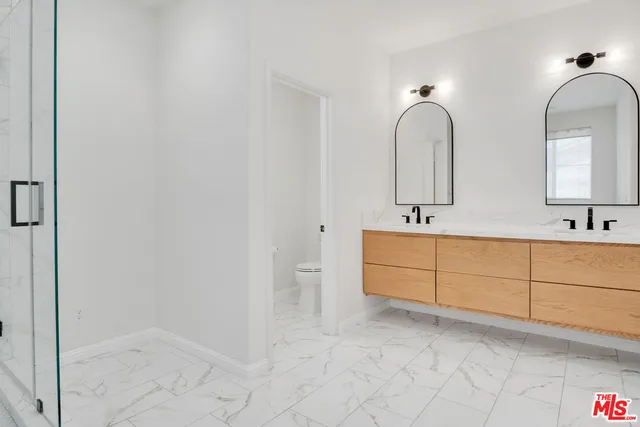 a front view of a house with a garage