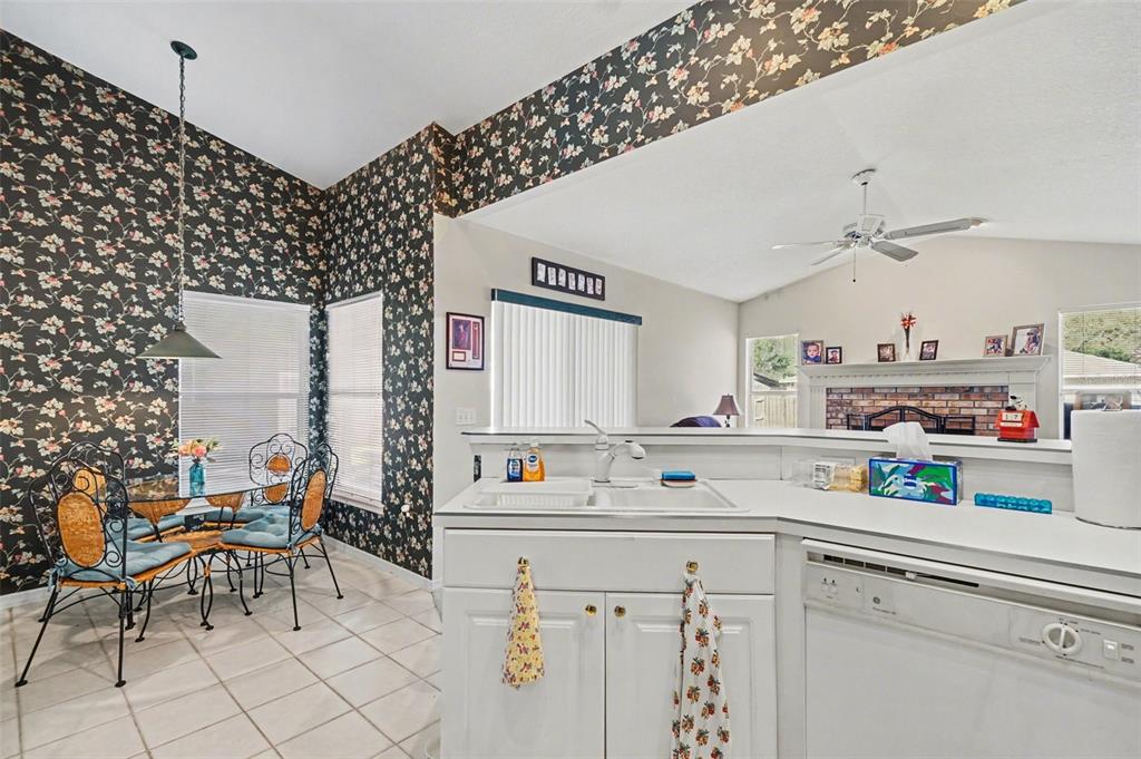 1670 East Spring Ridge Circle Winter Garden, FL 34787 - Photo 11 of 30 a kitchen with a sink and cabinets