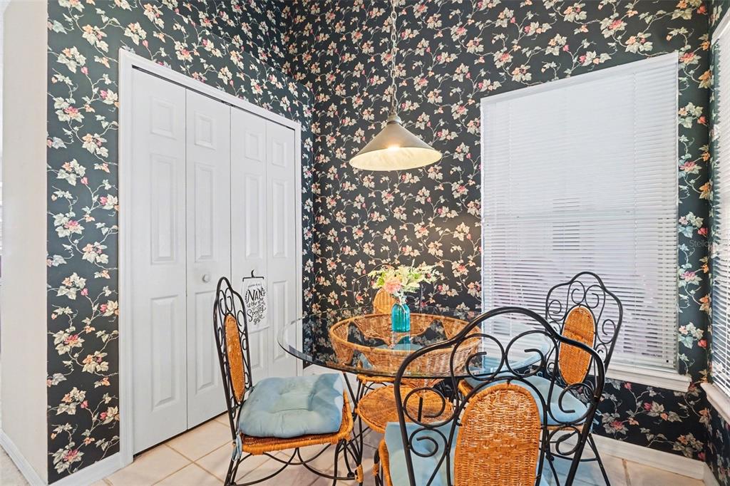 1670 East Spring Ridge Circle Winter Garden, FL 34787 - Photo 10 of 30 a view of a chairs and table in the balcony