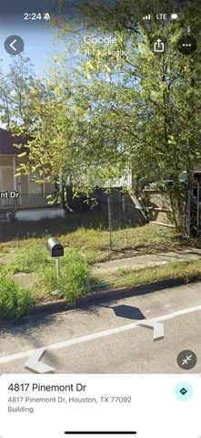 a view of swimming pool from a yard