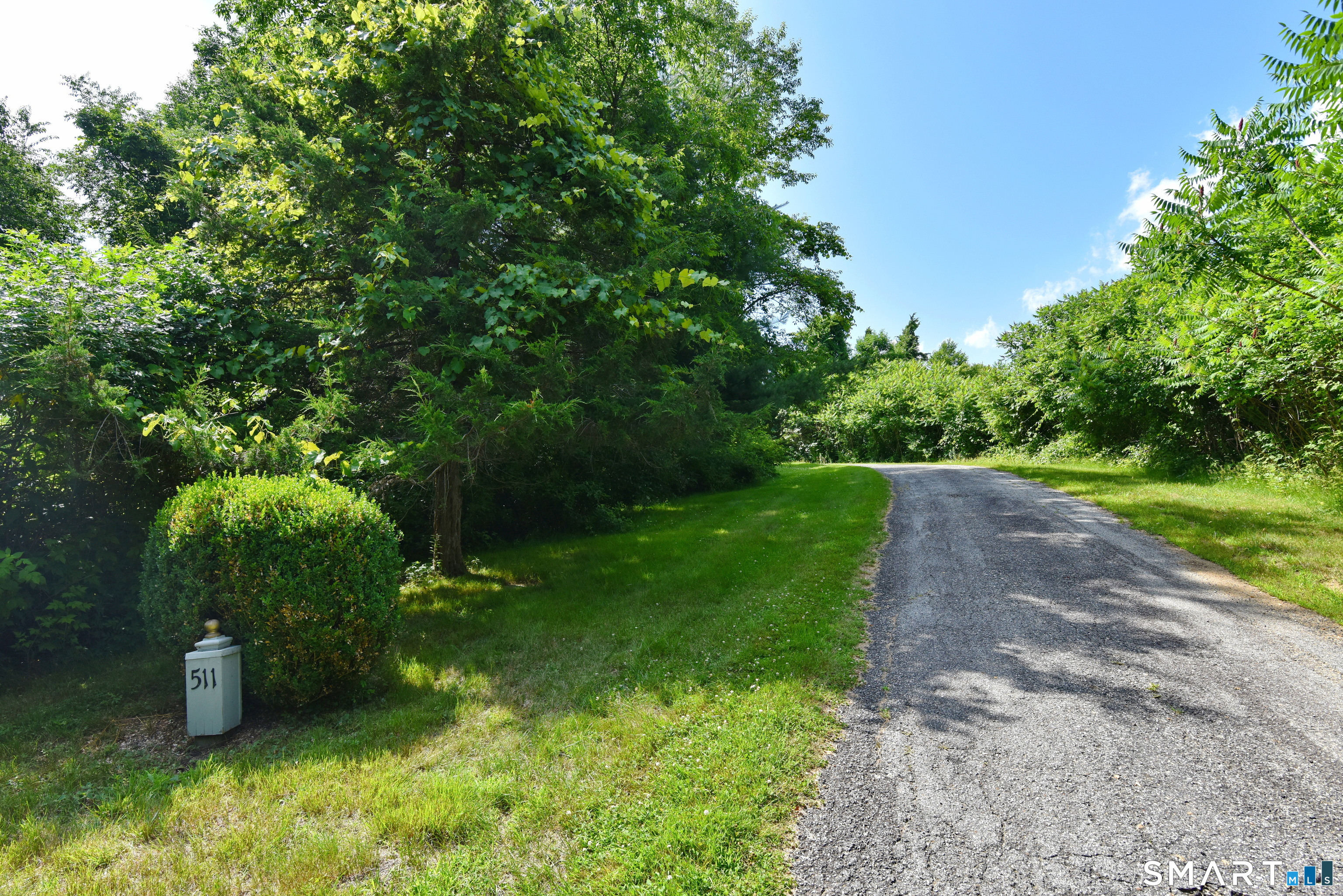 511 Perrin Road Woodstock, CT 06281 - Photo 35 of 40 A long paved driveway winds through picturesque grounds to this beautifully crafted home.