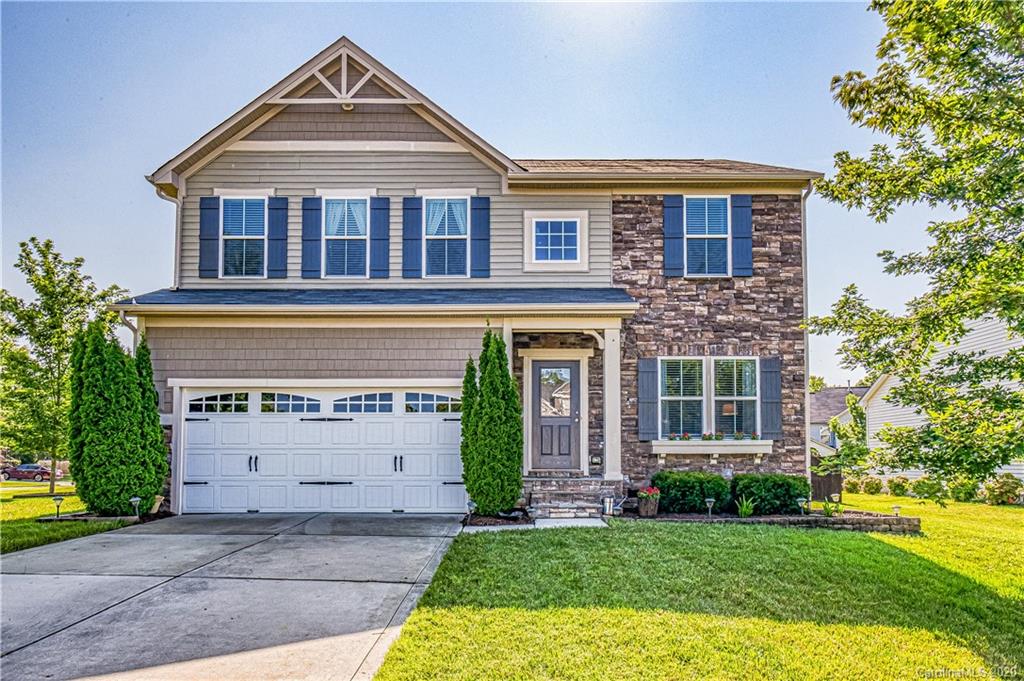 640 Alsace Lane Fort Mill, SC 29708 - Photo 1 of 36 a front view of a house with a yard