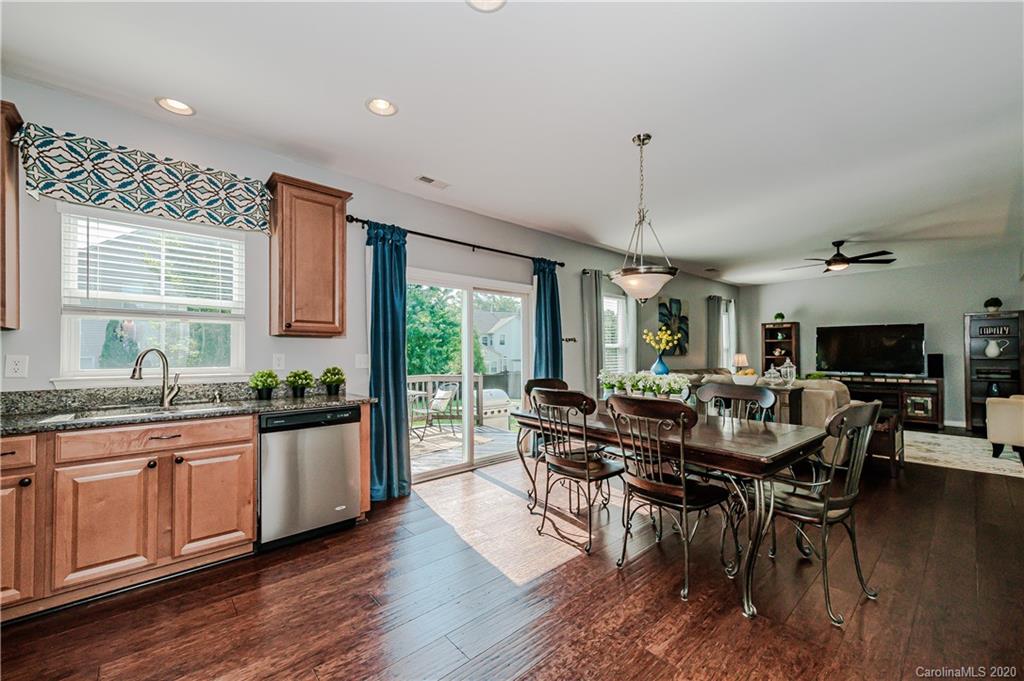 640 Alsace Lane Fort Mill, SC 29708 - Photo 16 of 36 a view of a dining room with furniture window and wooden floor
