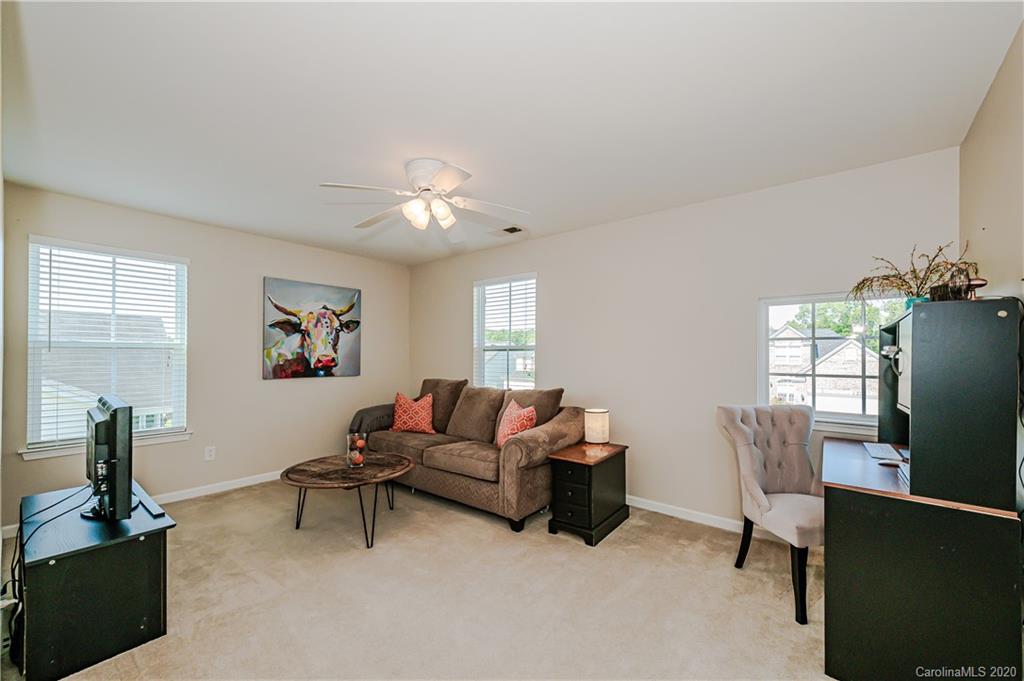 640 Alsace Lane Fort Mill, SC 29708 - Photo 29 of 36 a living room with furniture and a window
