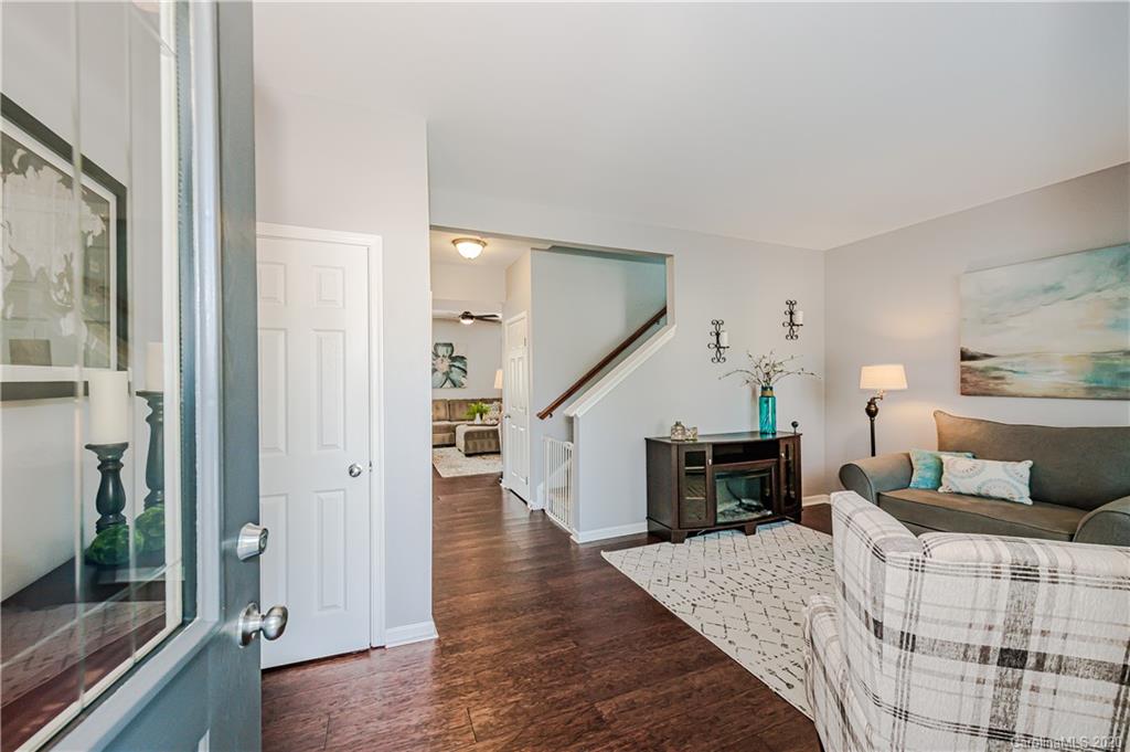 640 Alsace Lane Fort Mill, SC 29708 - Photo 4 of 36 a bedroom with furniture and wooden floor