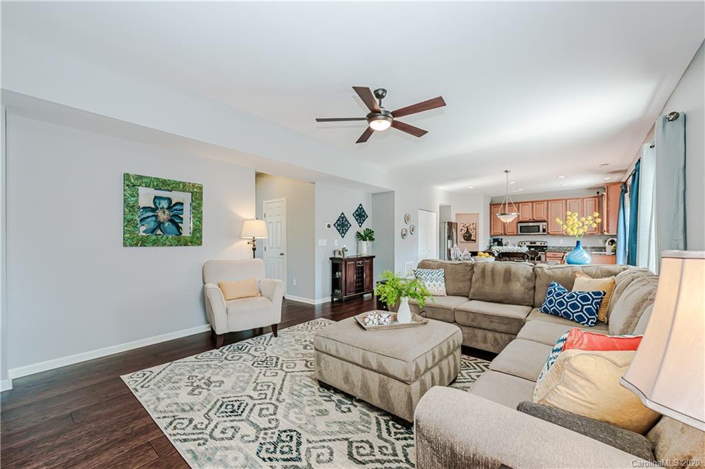 640 Alsace Lane Fort Mill, SC 29708 - Photo 8 of 36 a living room with furniture and a view of kitchen