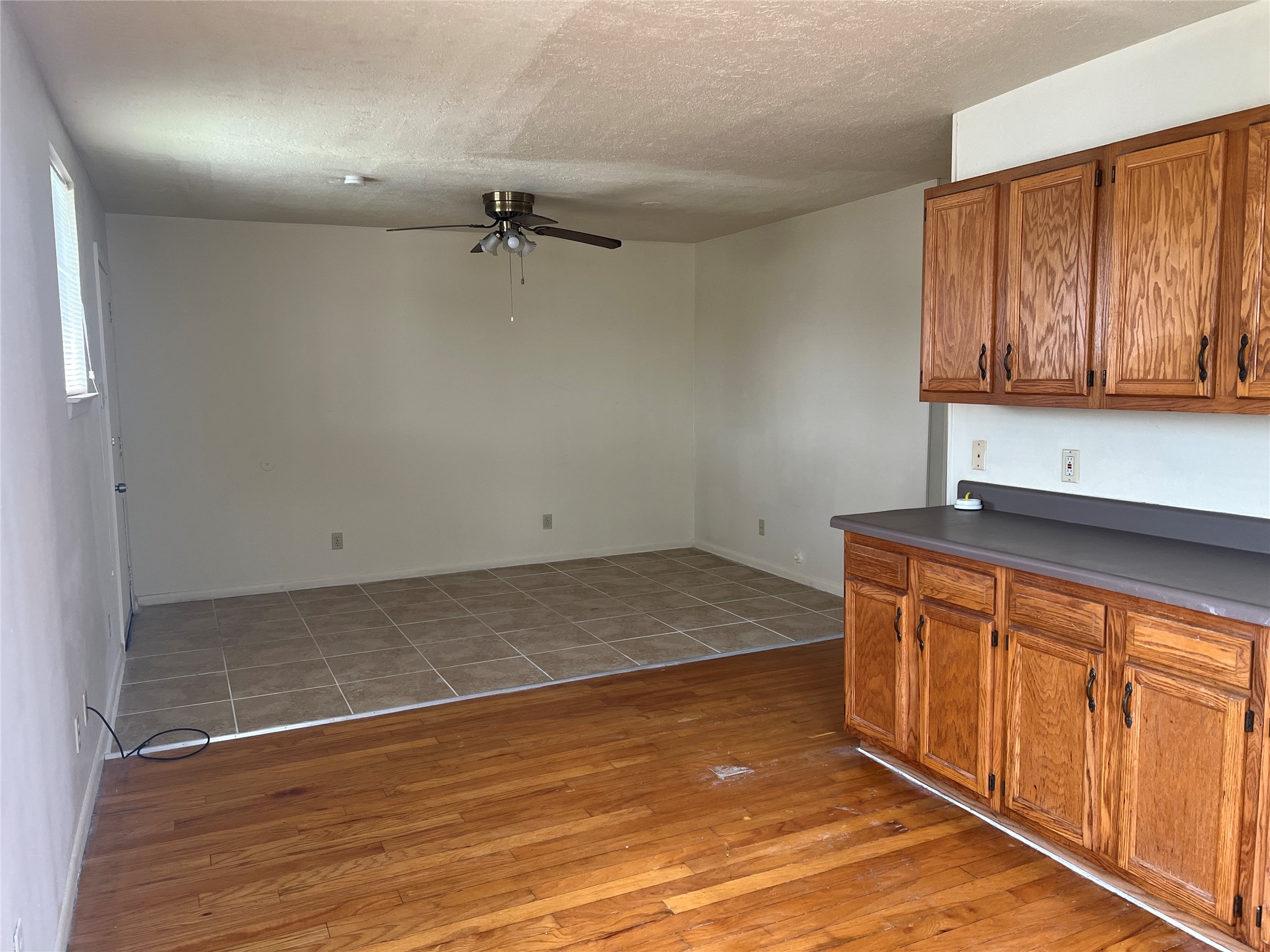 1201 Gillette Street, Unit 4 Houston, TX 77019 - Photo 3 of 12 a view of a room with wooden floor and cabinet