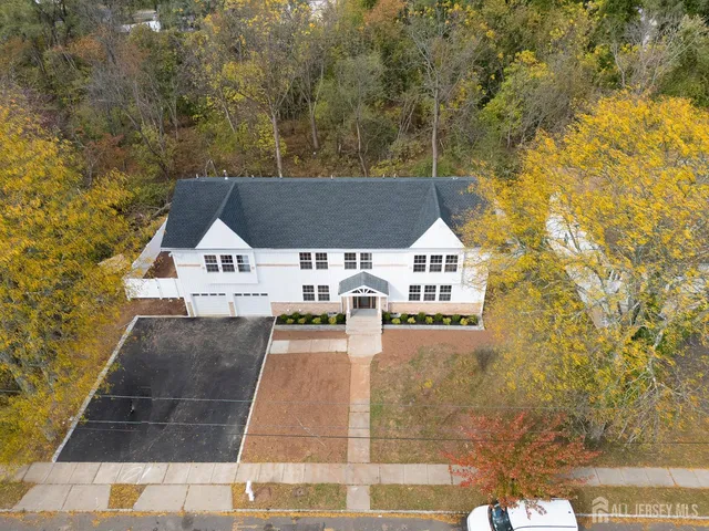 a view of residential houses with outdoor space