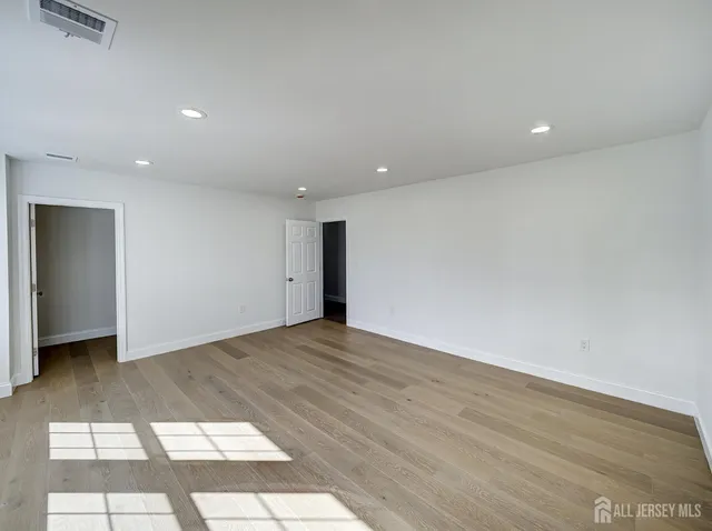 a view of livingroom with furniture and wooden floor
