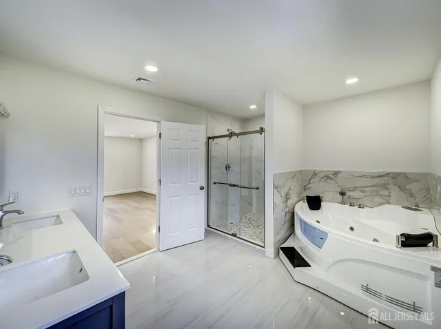 an empty room with wooden floor