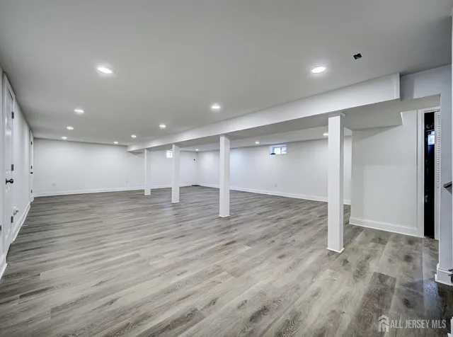 a bathroom with a toilet sink and shower