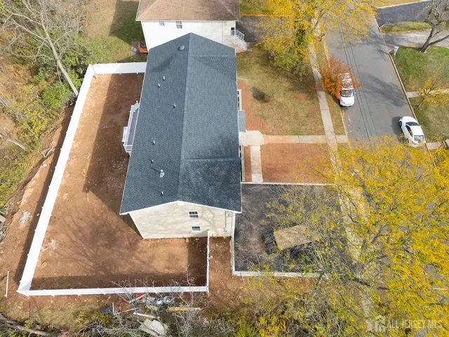 a bathroom with a granite countertop shower and a sink