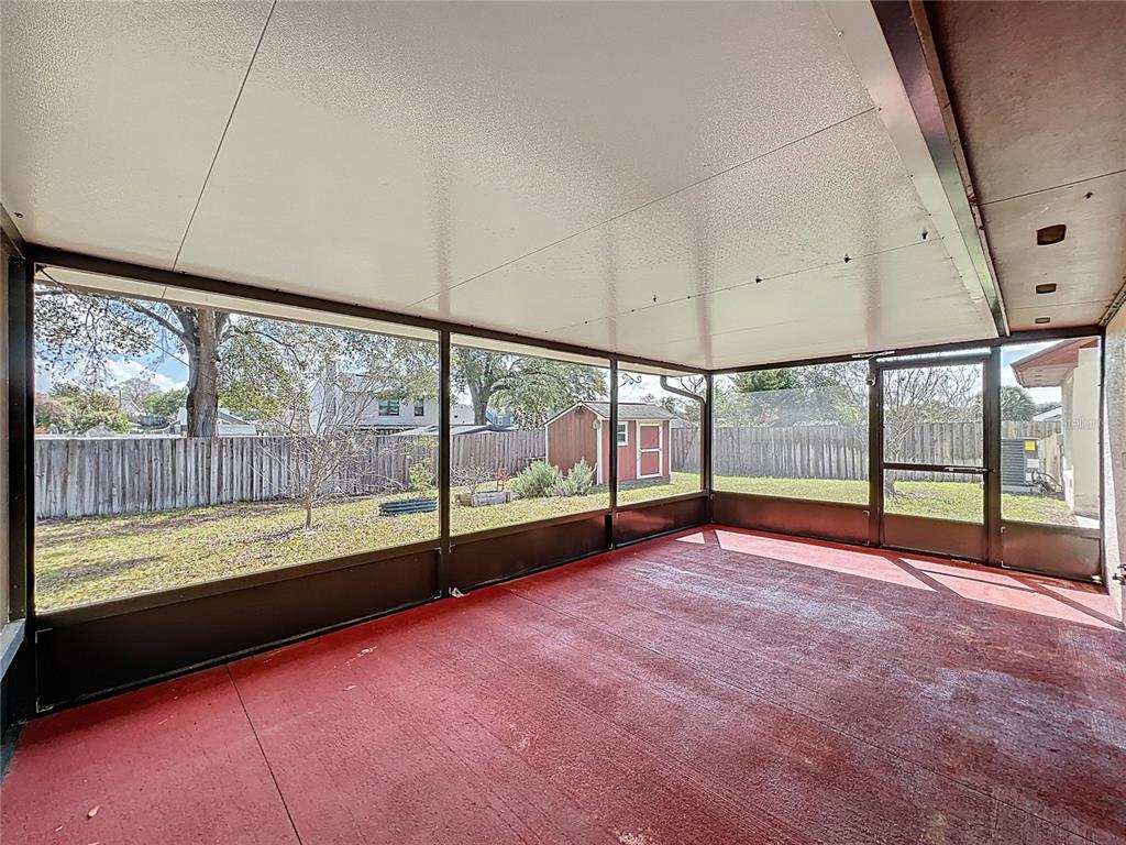 2843 Danforth Drive Orlando, FL 32818 - Photo 22 of 41 a view of an empty room with a large window