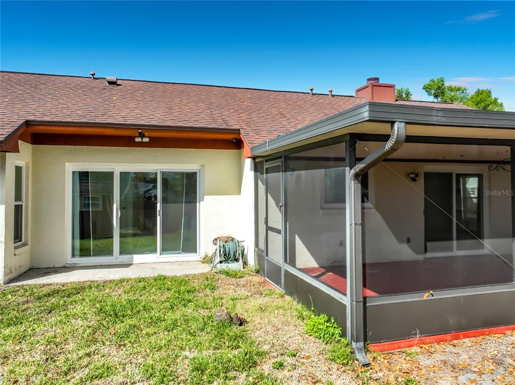 2843 Danforth Drive Orlando, FL 32818 - Photo 24 of 41 a front view of a house with a yard