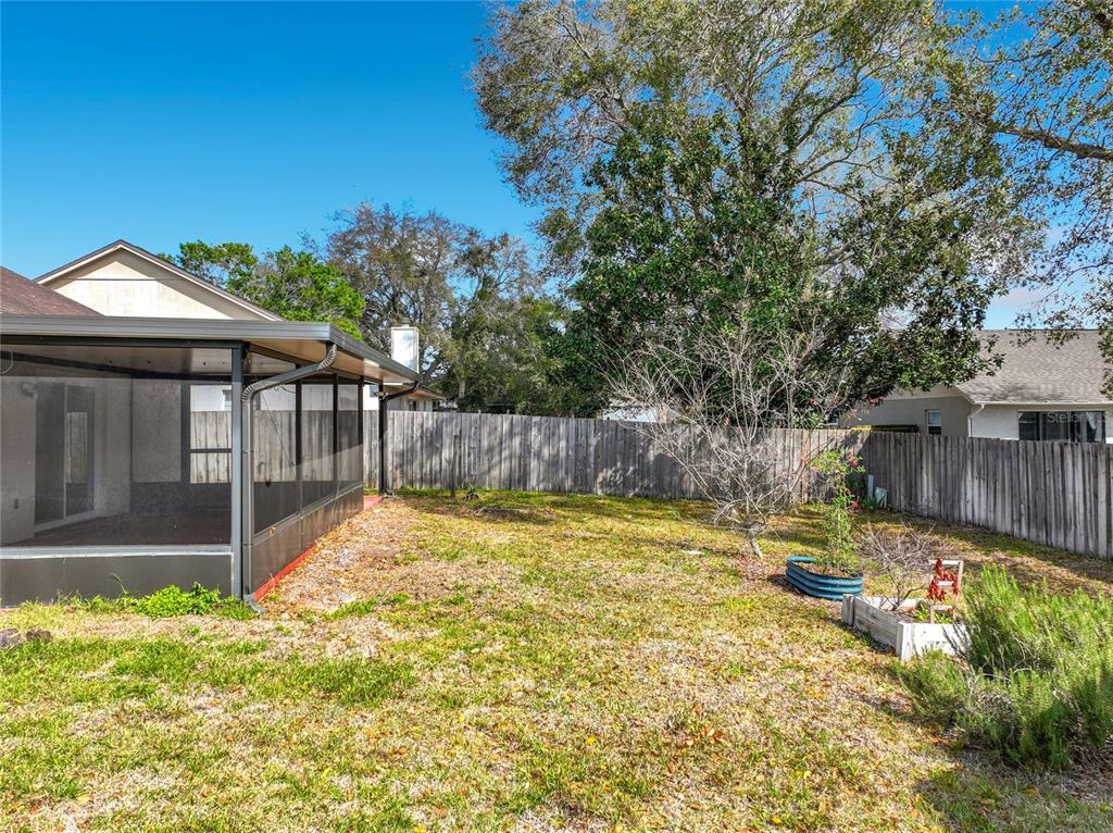 2843 Danforth Drive Orlando, FL 32818 - Photo 25 of 41 a view of swimming pool with a patio
