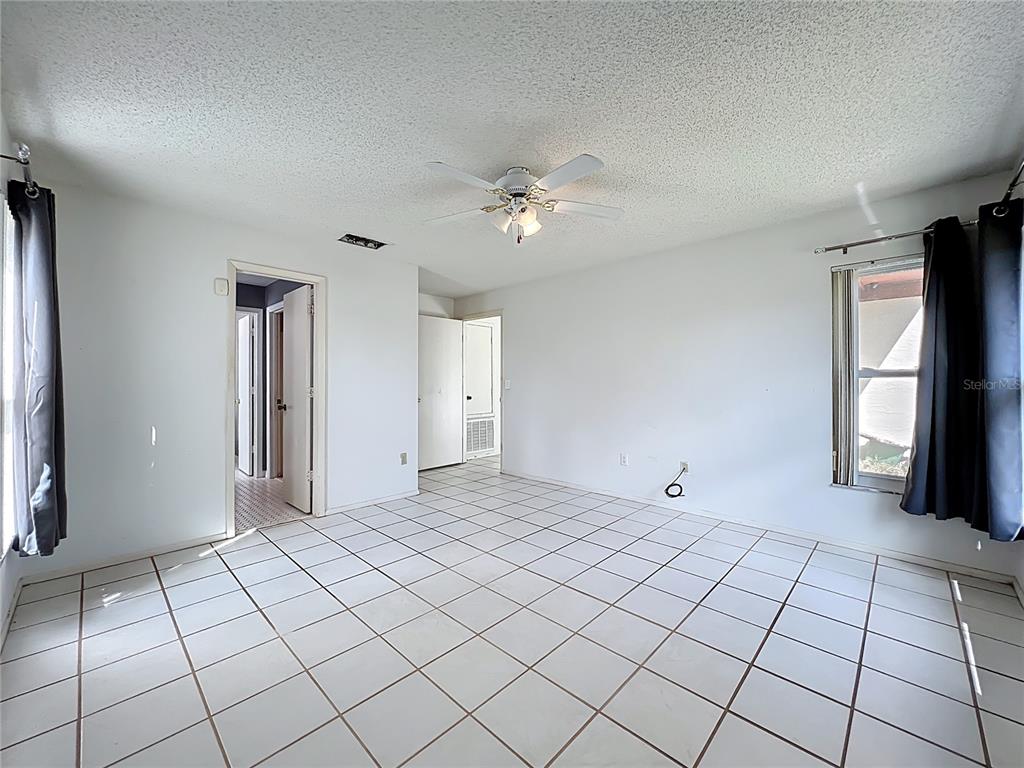 2843 Danforth Drive Orlando, FL 32818 - Photo 32 of 41 a view of an empty room and window