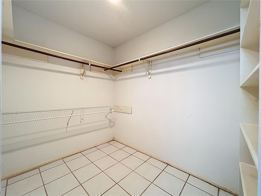 2843 Danforth Drive Orlando, FL 32818 - Photo 36 of 41 a view of a room with racks on the wall