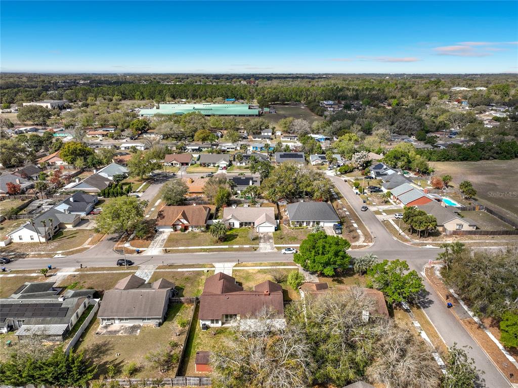 2843 Danforth Drive Orlando, FL 32818 - Photo 38 of 41 an aerial view of residential building with parking space